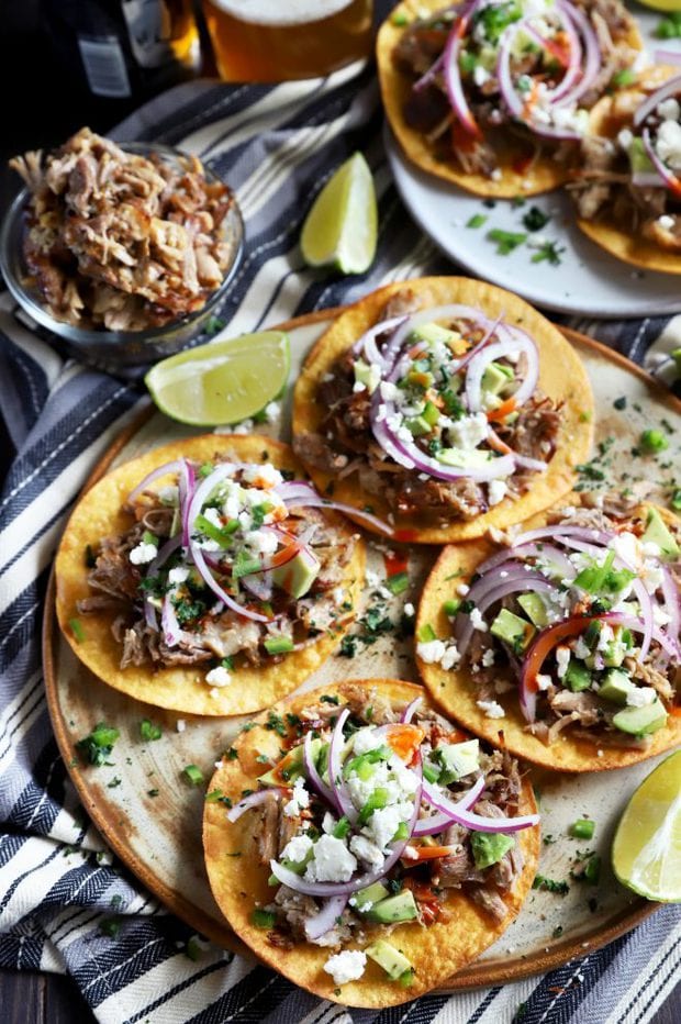 Pork tostadas topped with lots of toppings