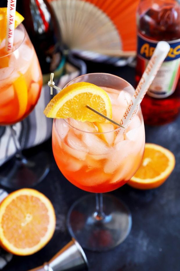 Aperol Spritz cocktail with a straw in it