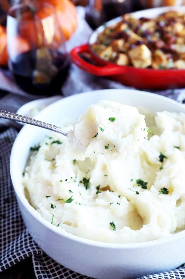 Scooping out Instant Pot mashed potatoes