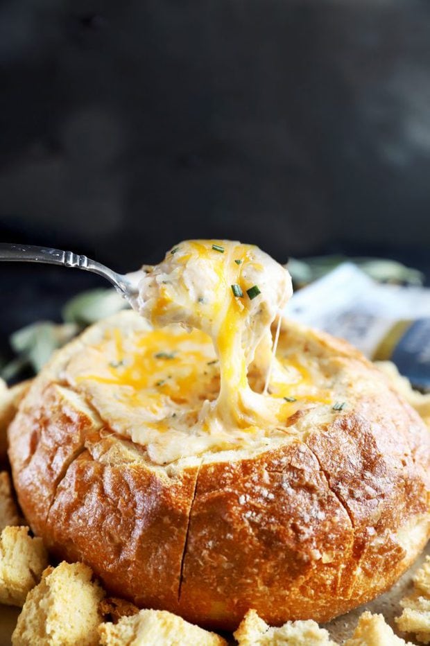 Cheese pull from bread bowl