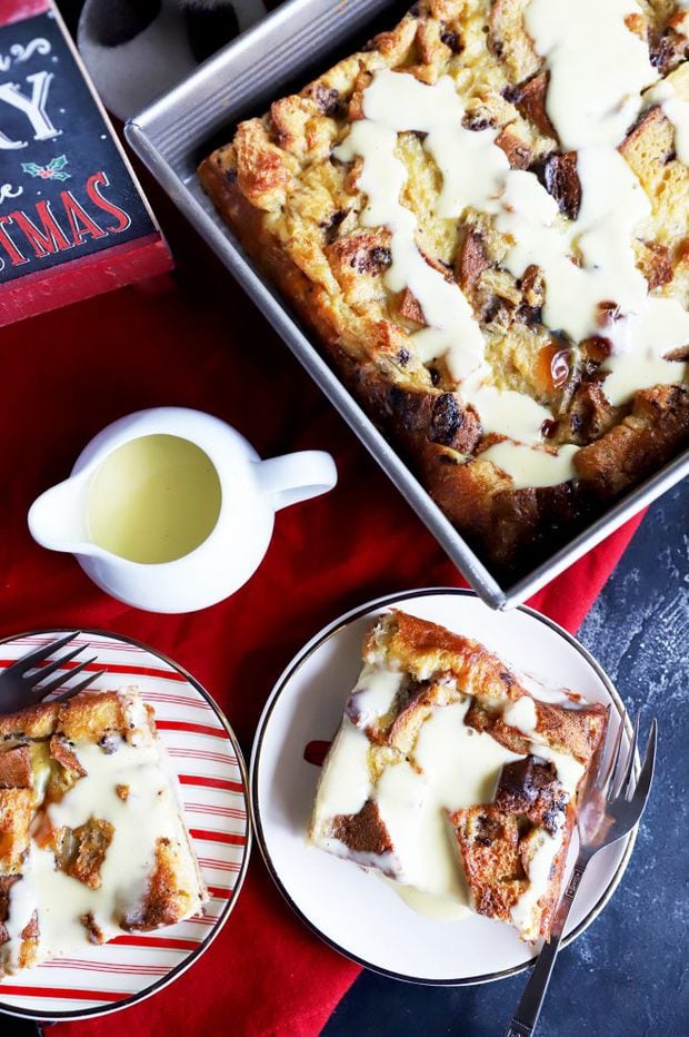 Overhead photo of slices of bread pudding with creme anglaise