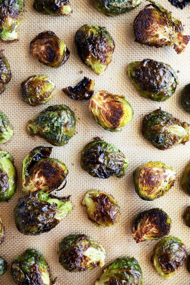 Cooked brussels sprouts on a baking sheet