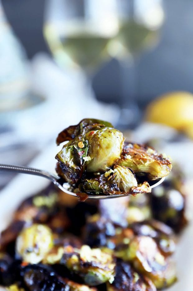 Side photo of brussels sprouts on a spoon photo