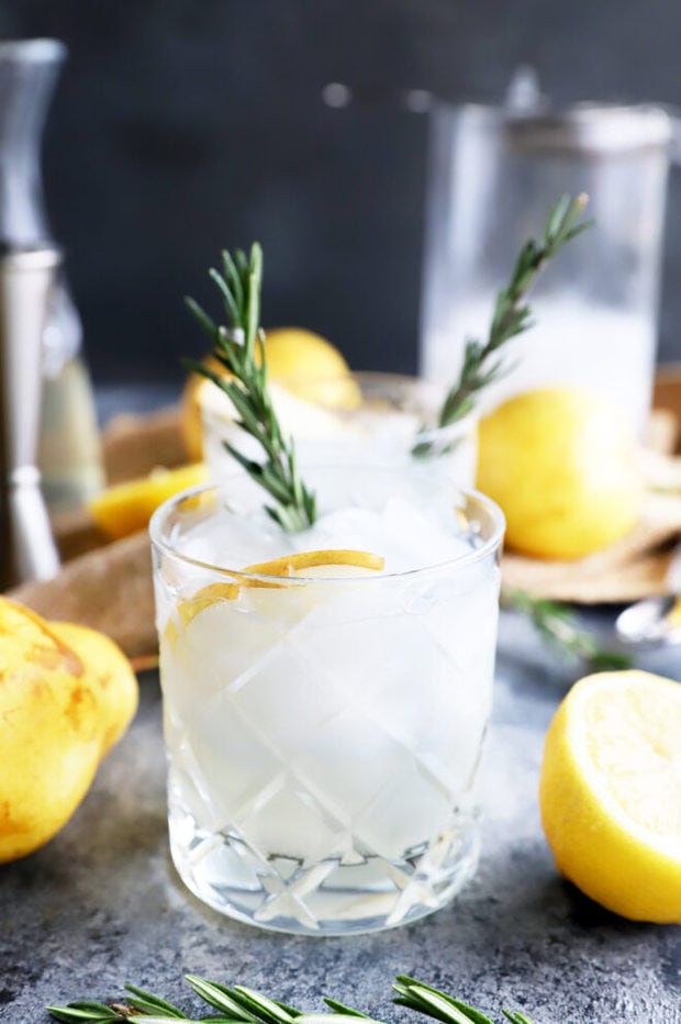 Cocktail in a glass with rosemary and pear photo