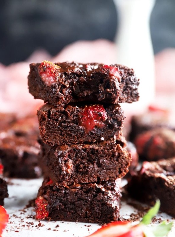 Bite out of a chocolate strawberry brownie photo