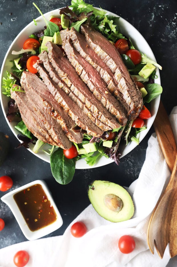 Steak salad image with dressing