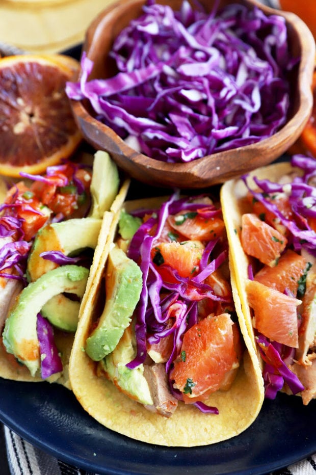 Blood orange chicken tacos on a plate image