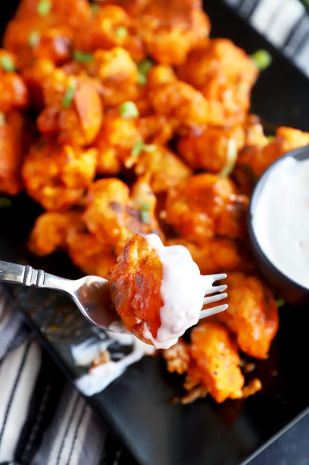 Buffalo cauliflower dipped in sauce image