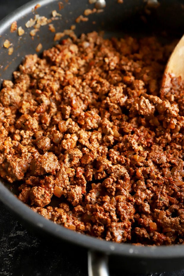 Ground beef cooking in a pan photo