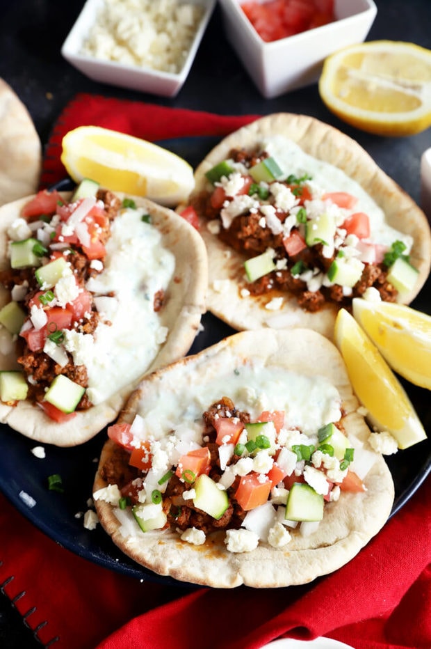 Greek beef pitas on a plate photo