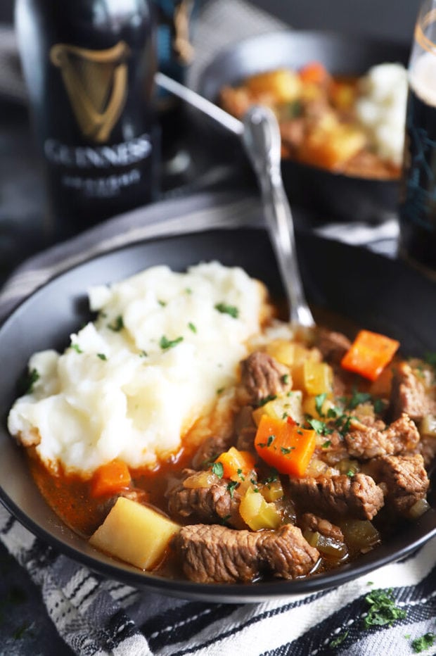 Stew in a bowl with potatoes image