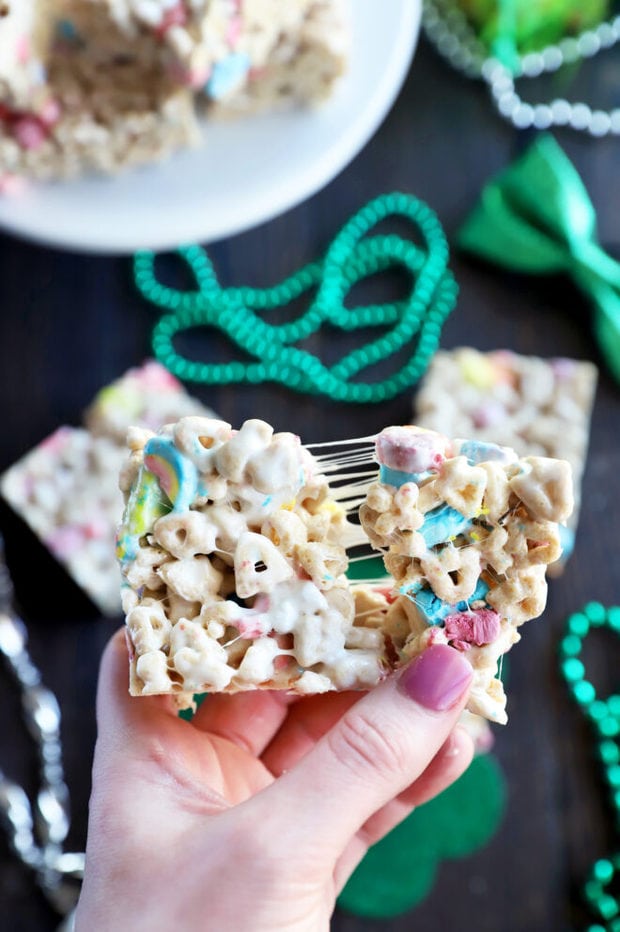 Hand pulling apart cereal treat photo