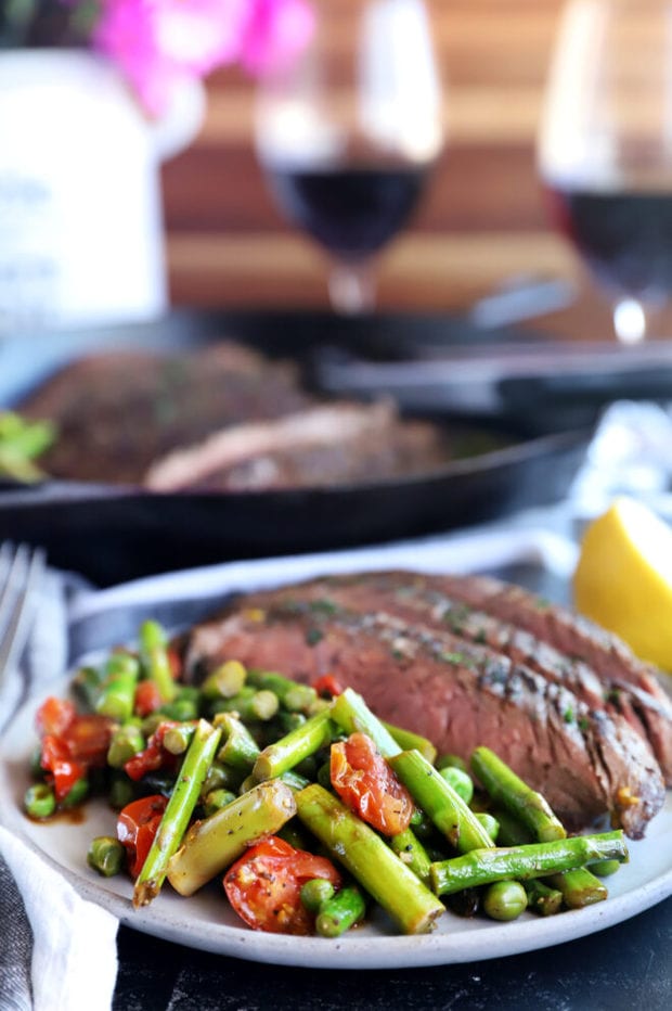 Steak and vegetables on a plate with flowers image