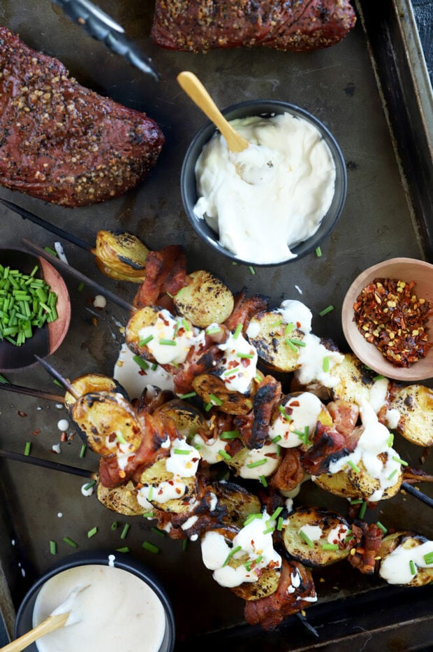 Loaded bacon potato skewers with steaks