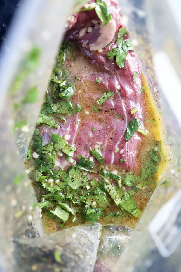 Mojo steak in marinade photo