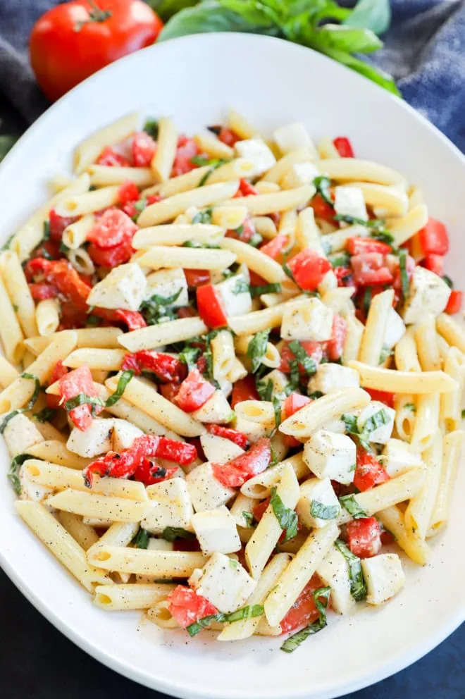 bright lemon penne side dish in large bowl for summer dinner