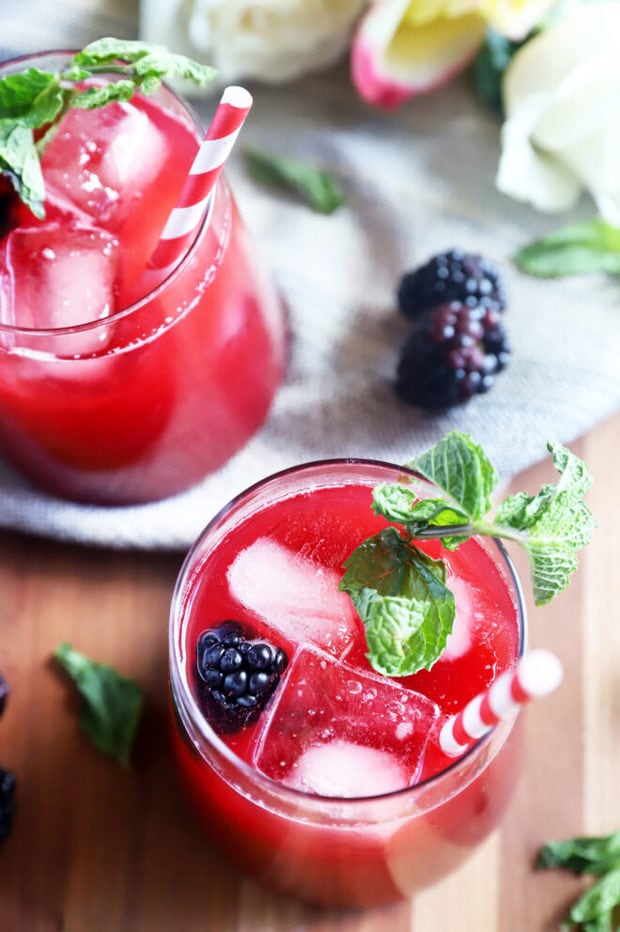 Cocktail with blackberries and mint photo