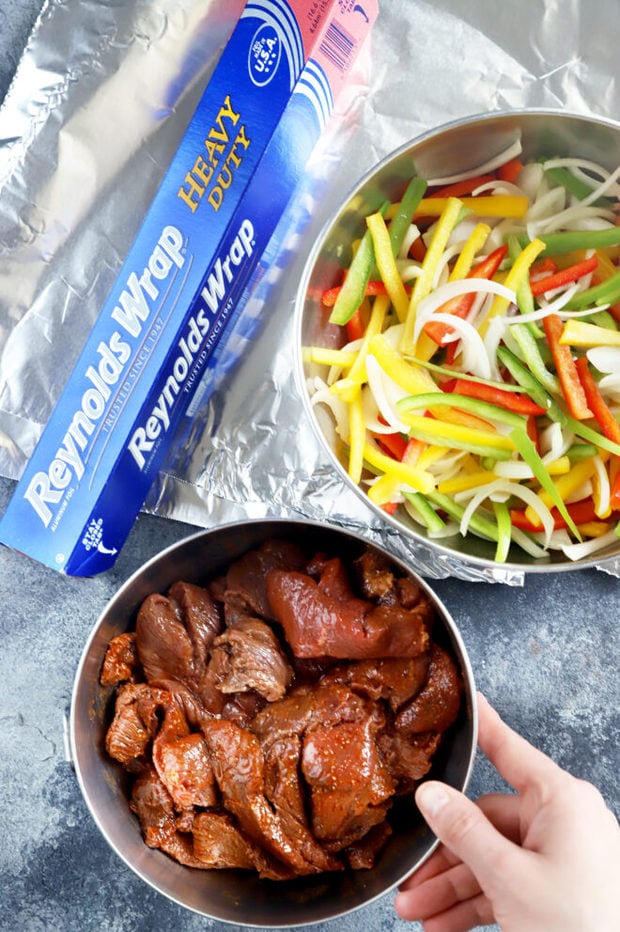 Prepping steak fajitas photo