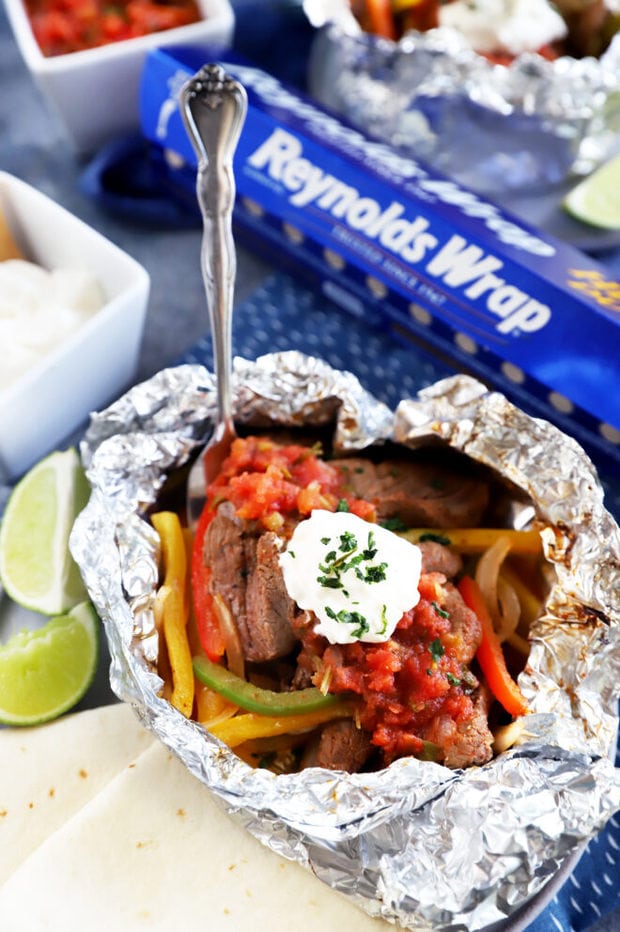 Steak fajita foil packet with fork picture