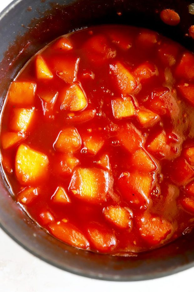 Cooking barbecue sauce in a pan image