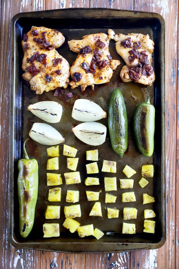 Roasted vegetables and chicken on sheet pan image