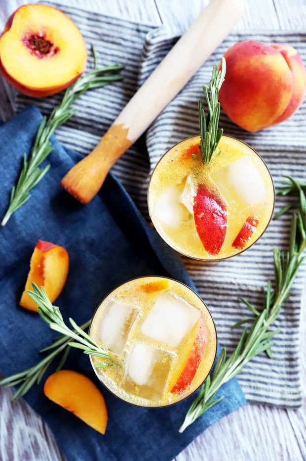 Overhead photo of summer drinks with rosemary