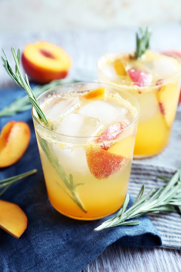 Side photo of peach mocktail in glasses