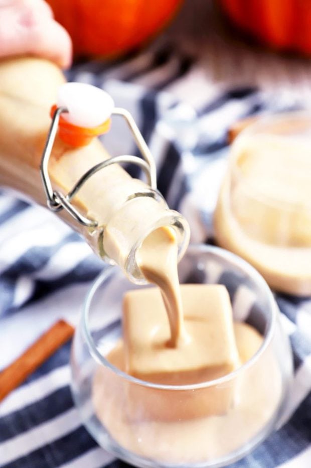 Pouring Irish cream over ice image