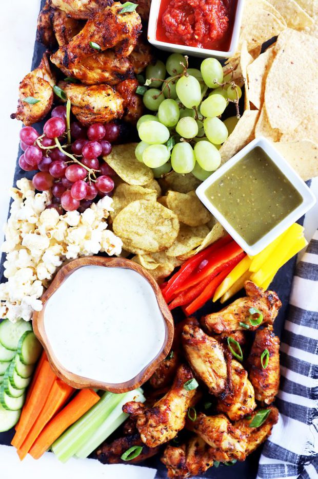 Image of snack board with wings and vegetables