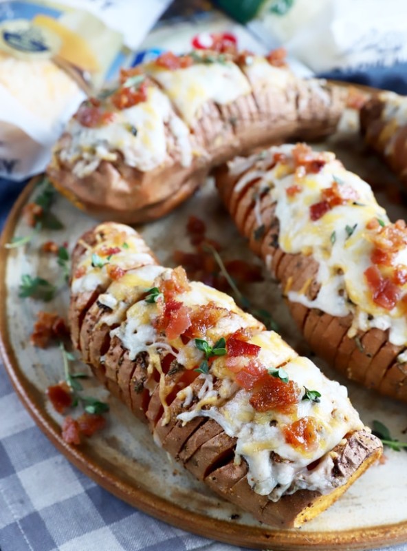 Cheesy hasselback sweet potatoes on plate image