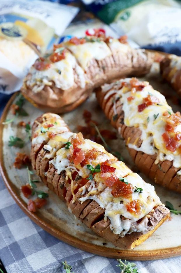 Cheesy hasselback sweet potatoes on plate image