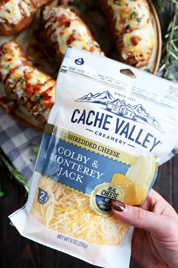 Hand holding Cache Valley Cheese bag image