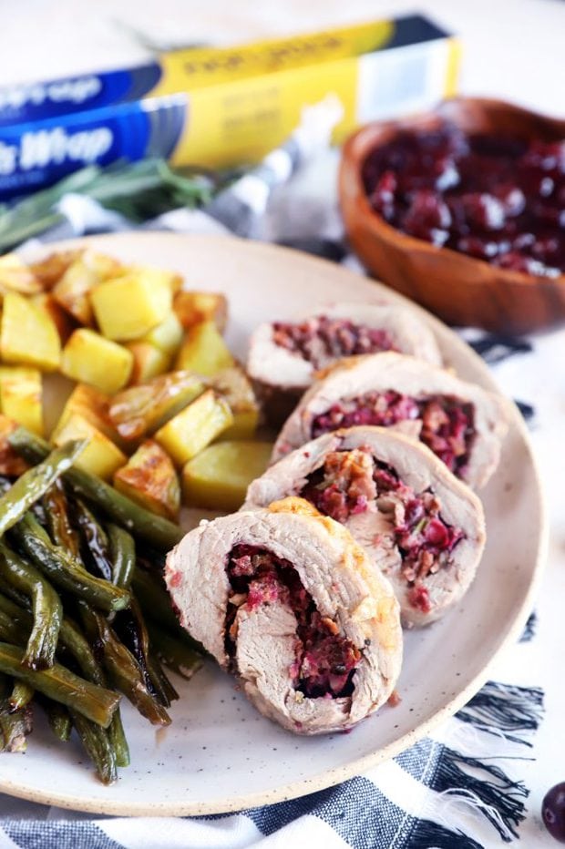 Image of sliced stuffed pork on a plate