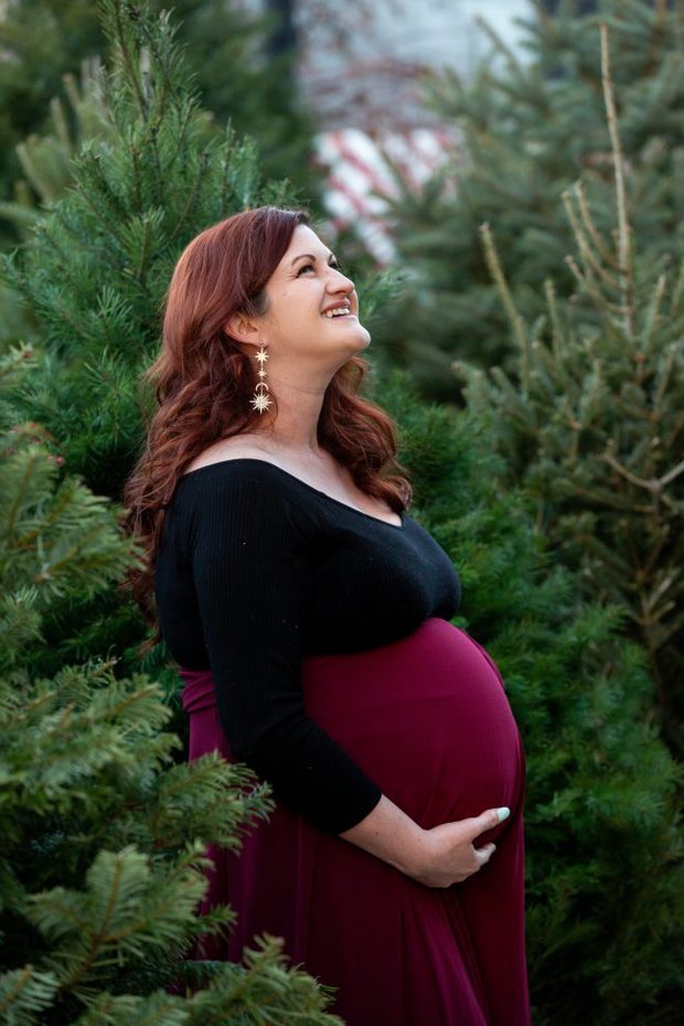 Maternity image with christmas tree farm