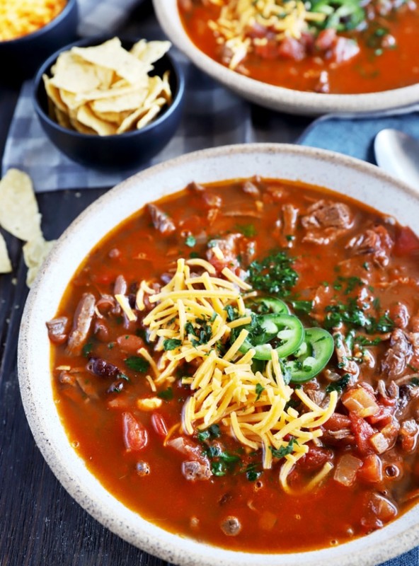 Bowl full of chili with steak image