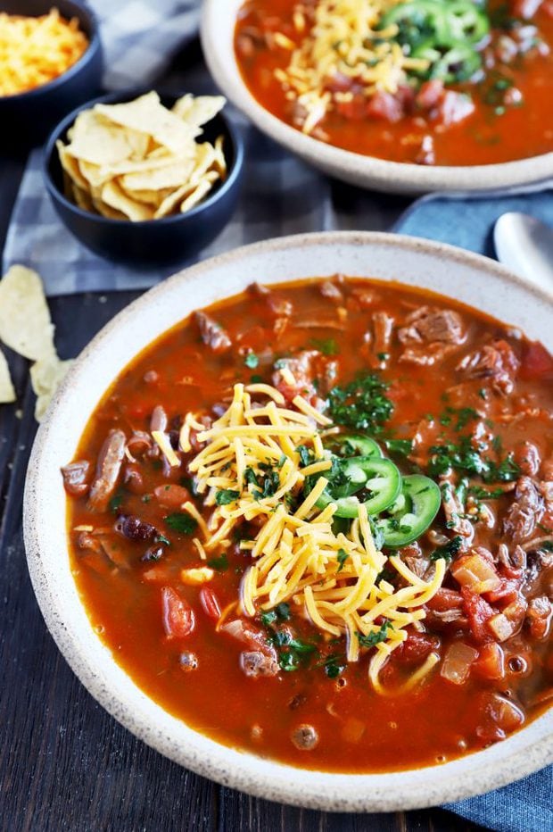Bowl full of chili with steak image