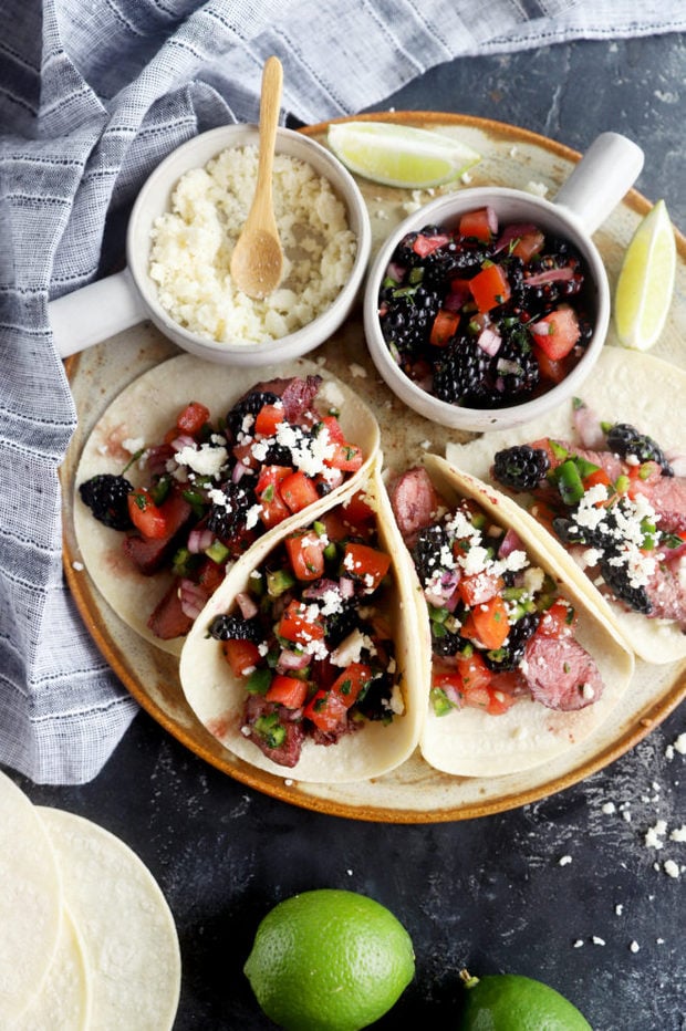 Overhead image of blackberry steak tacos