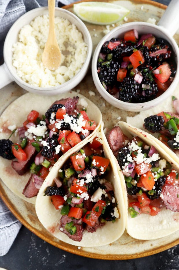 Overhead picture of steak tacos on a platter