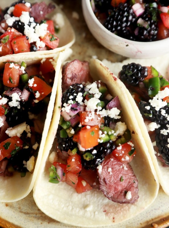 Steak tacos on platter with blackberry salsa image