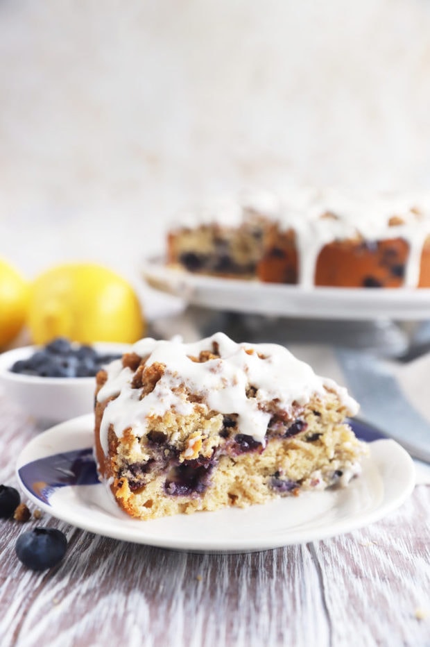 Blueberry slice of cake on a plate image