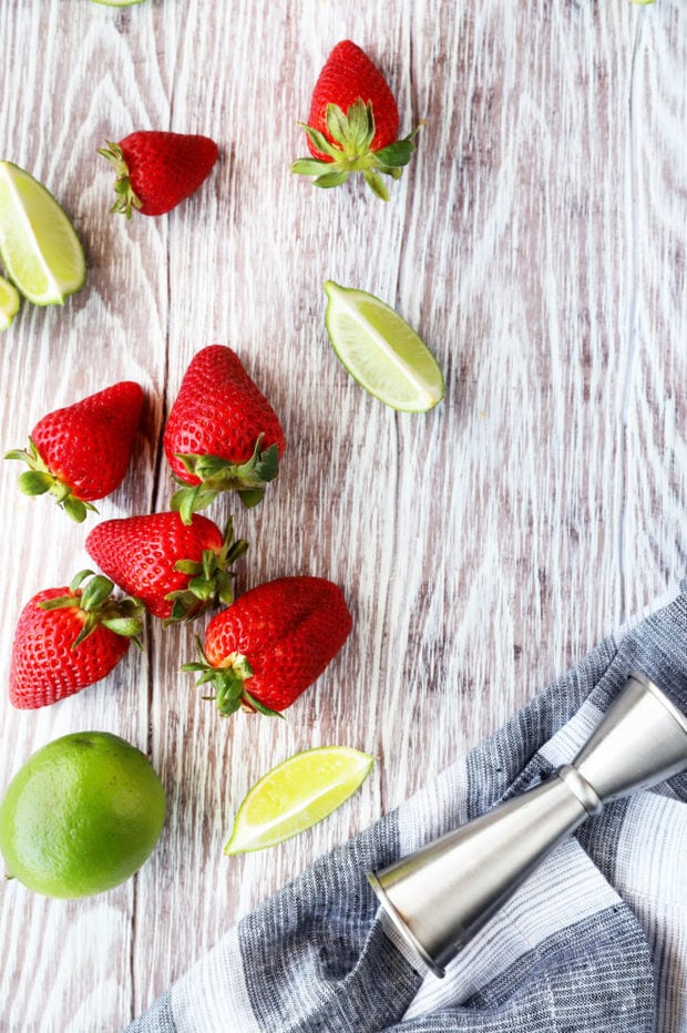 Overhead photo of strawberries and limes