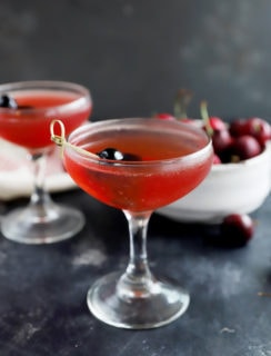Photo of cherry cocktail in coupe glasses