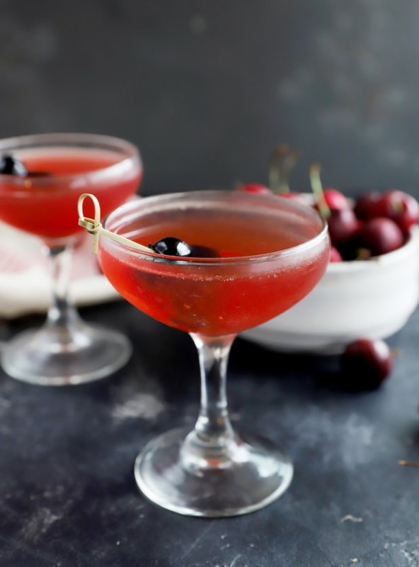 Photo of cherry cocktail in coupe glasses