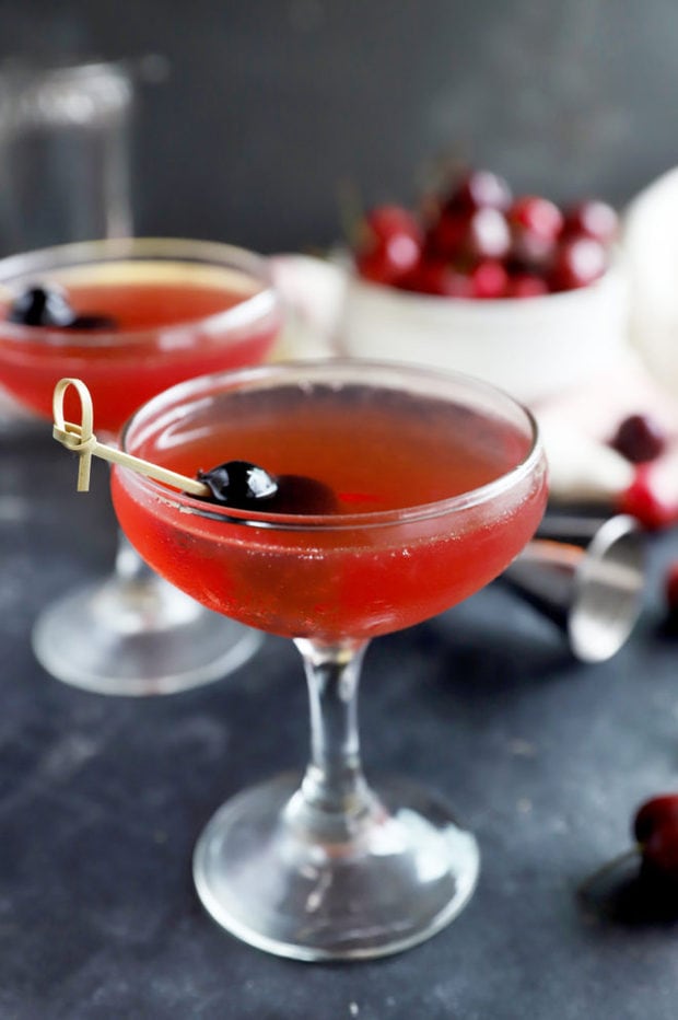 Side photo of cherry bourbon sour in glass