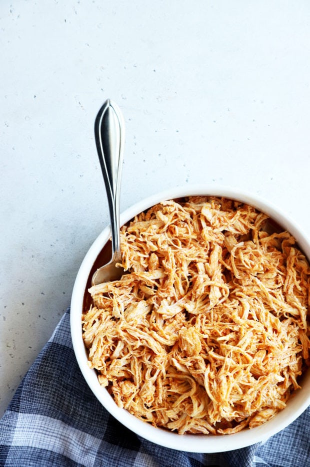 Image of shredded chicken in a bowl with fork