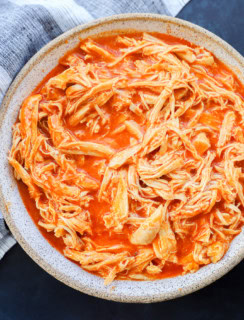Instant Pot Buffalo Chicken in a bowl with napkin
