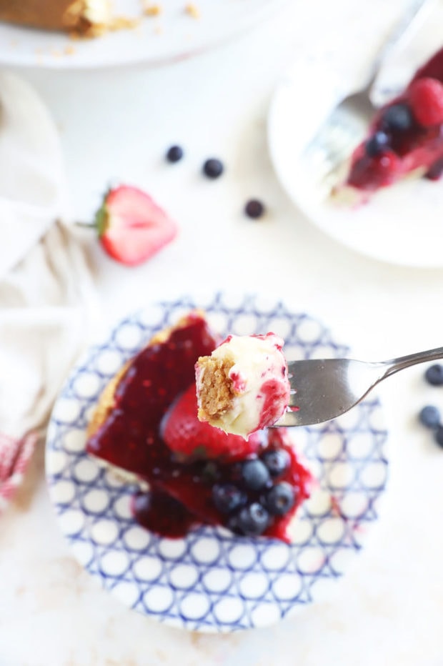 Image of a bite of cheesecake on a fork