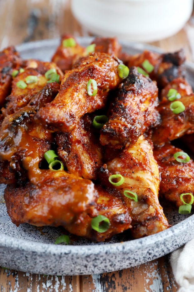 Side image of peach BBQ grilled chicken wings