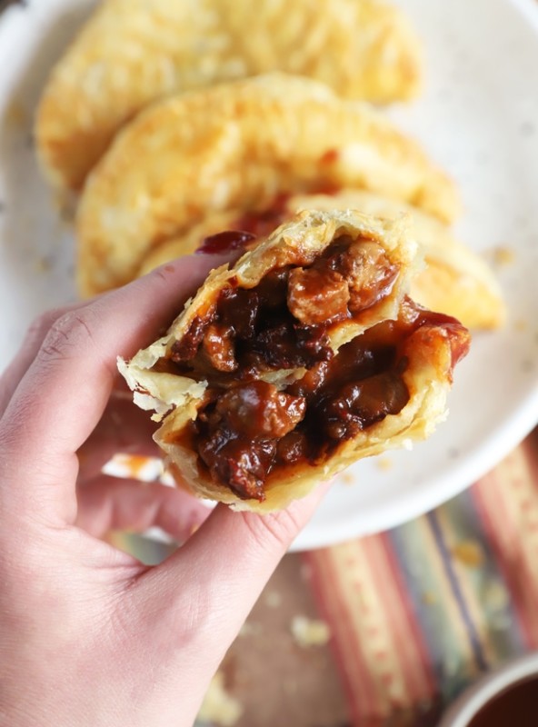 Hand holding empanadas photo