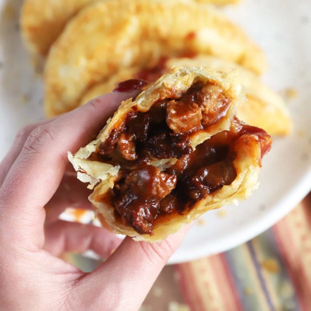 Hand holding empanadas photo